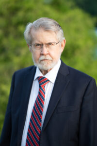 Dr. Walton Young